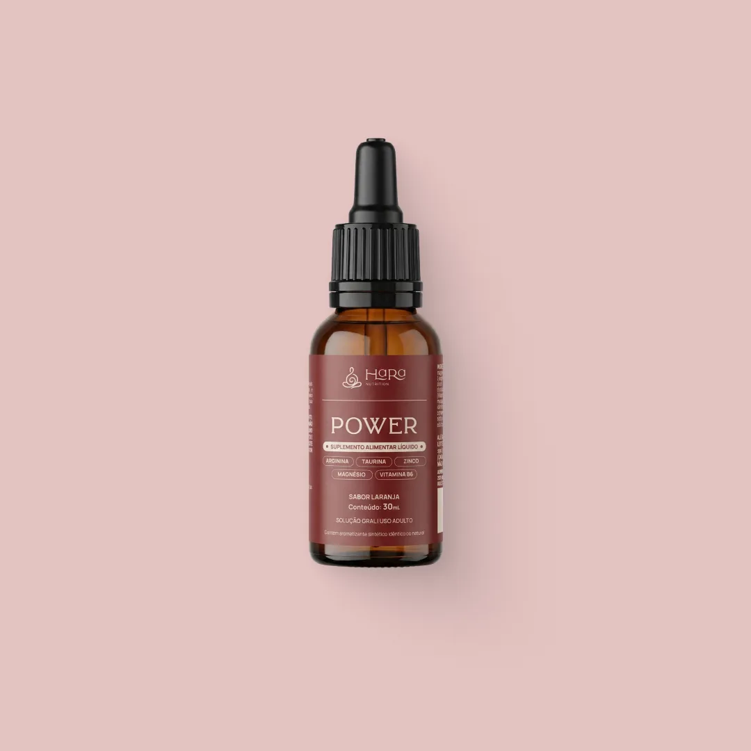 Frasco âmbar de Power em gotas da Hara Nutrition visto de frente, com conta-gotas preto, sabor laranja, conteúdo de 30 mL.